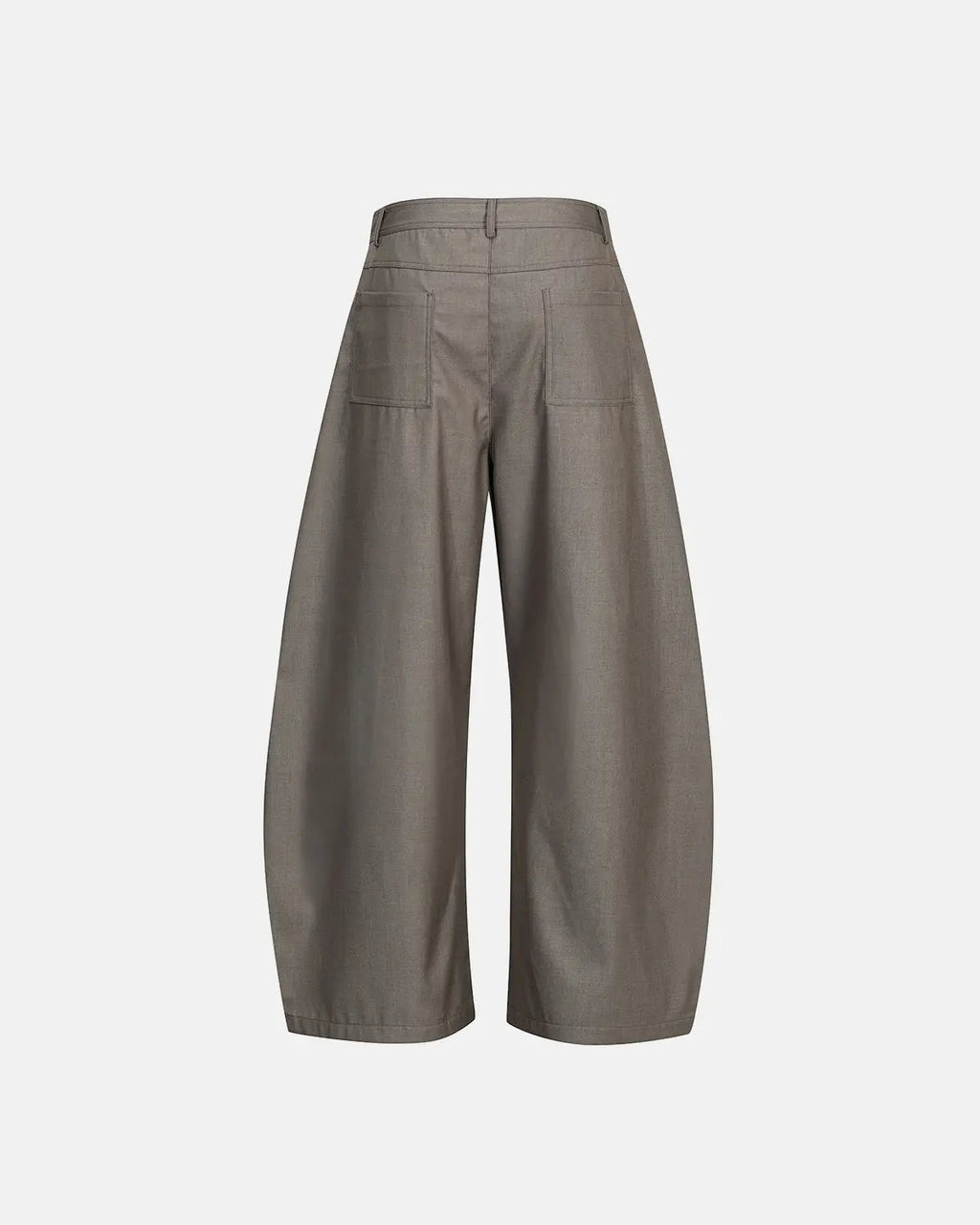 Asymmetric pleated barrel-leg suit pants by INFLATION, featuring a stylish, modern design with pleats and a relaxed fit.