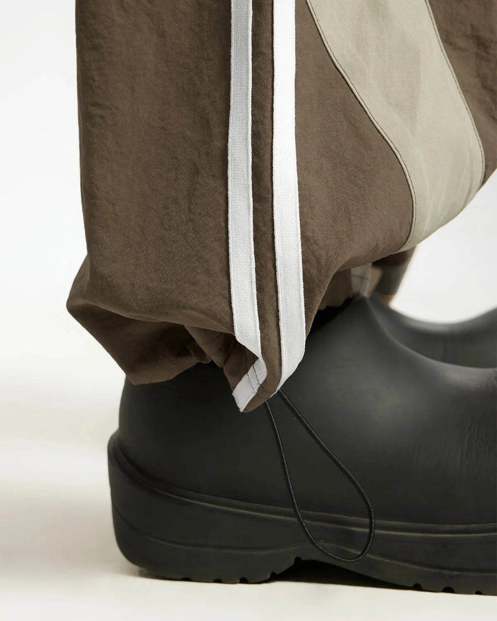 Inflation Streetwear striped casual pants with a relaxed fit and bold stripe pattern, perfect for everyday streetwear style.