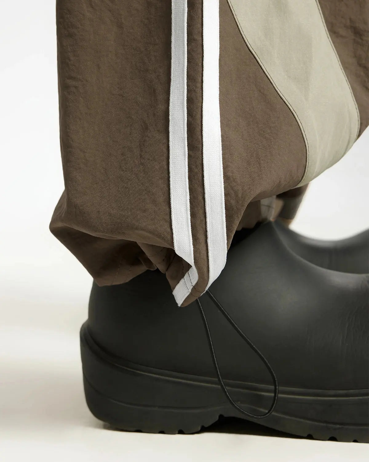Inflation Streetwear striped casual pants with a relaxed fit and bold stripe pattern, perfect for everyday streetwear style.