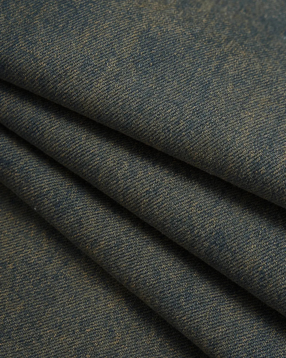 Flation washed loose-fit denim pants with distressed details, styled for streetwear, on a neutral background.