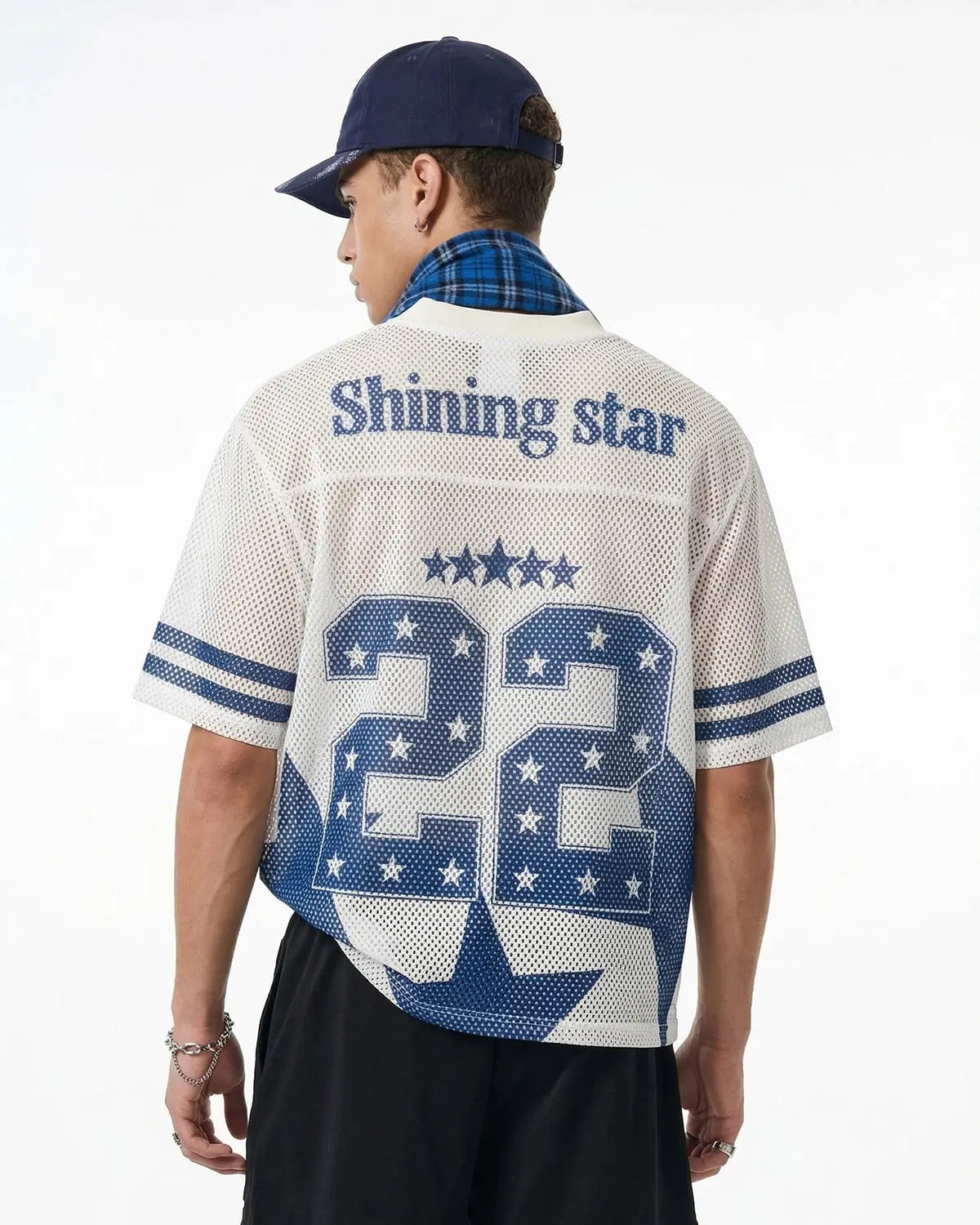 Star graphic oversized mesh jersey by INFLATION featuring a bold star design, lightweight mesh fabric, and streetwear-inspired style.