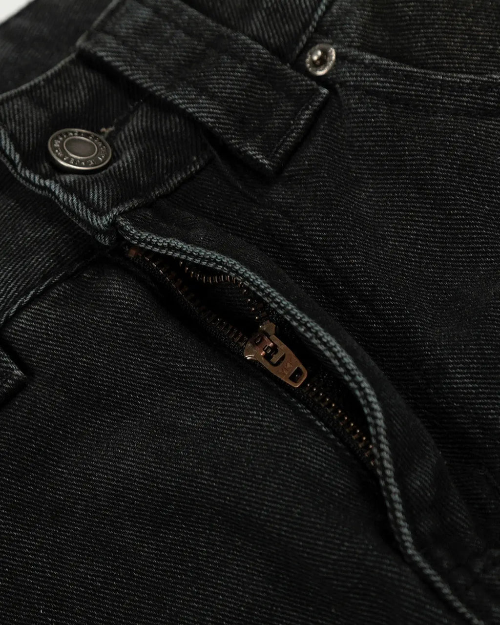 Black patchwork barrel jeans from INFLATION streetwear featuring a relaxed fit and detailed patchwork design.