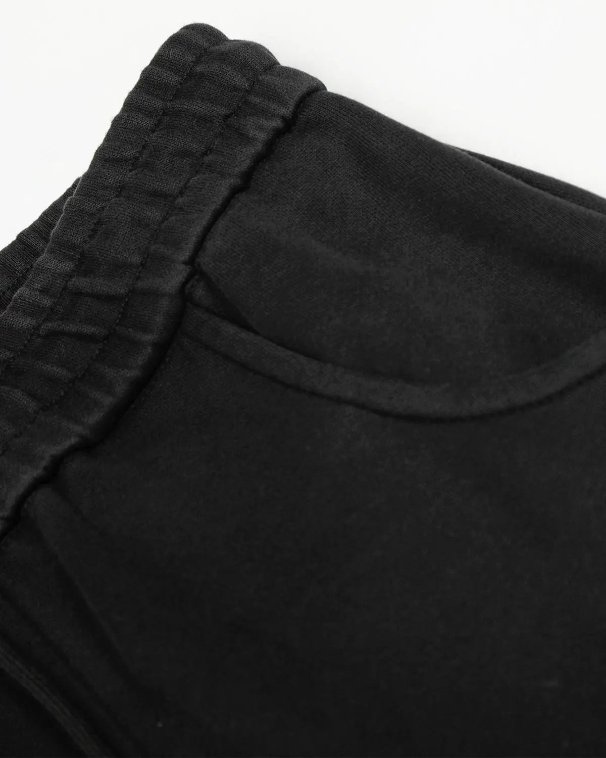Washed distressed barrel sweatpants by INFLATION featuring a relaxed fit and faded, worn-in denim style with distressed details.