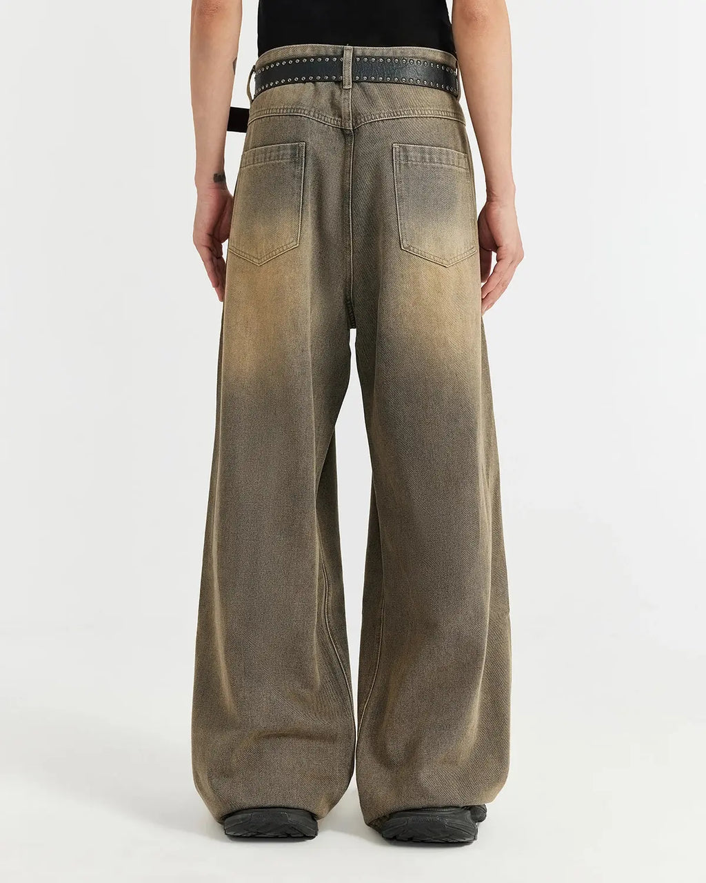 Brown acid wash baggy jeans by Flation featuring a relaxed fit, distressed acid wash fabric, and casual streetwear style.