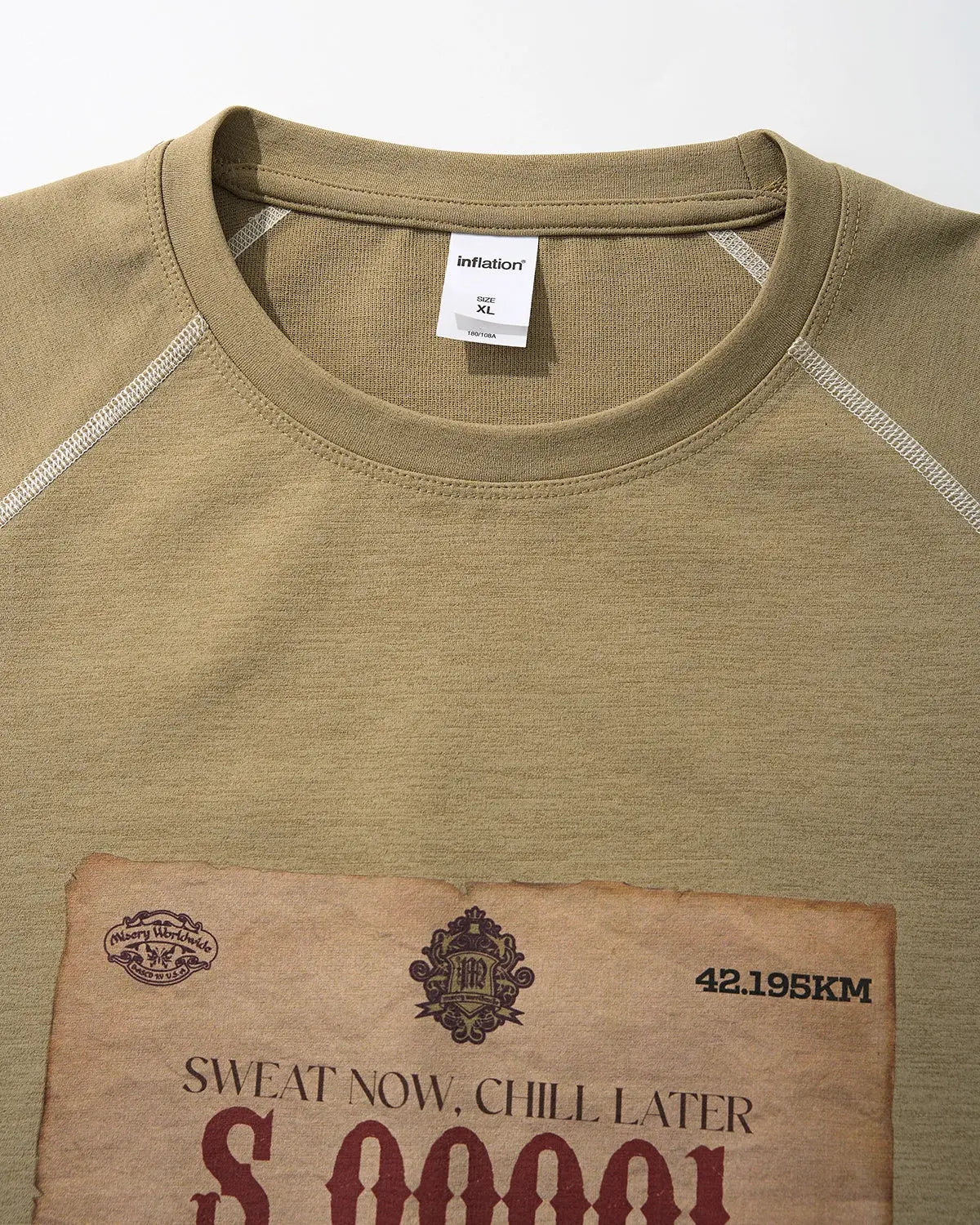 Inflation Streetwear retro graphic print raglan T-shirt with bold colorful design, long sleeves, and casual fit.