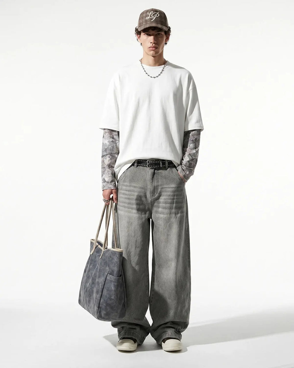 Camo layered oversized T-shirt by Flation Streetwear featuring a relaxed fit and camouflage pattern, displayed on a plain background.