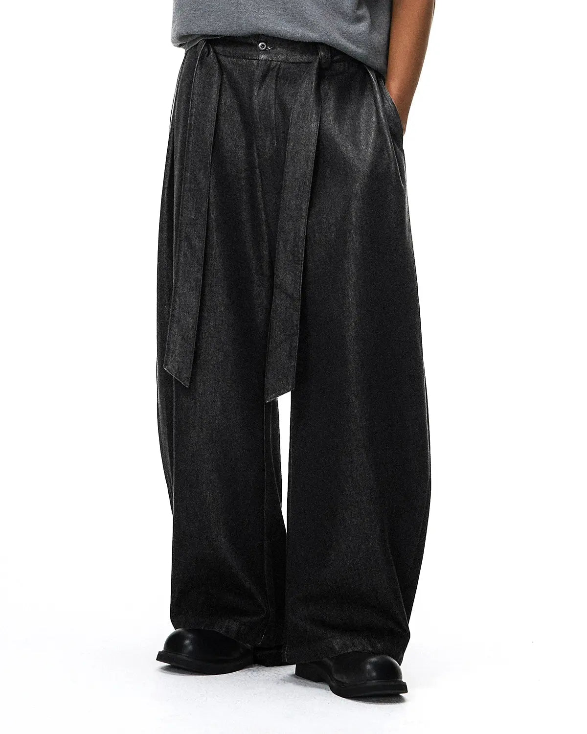 Raw silky denim jeans with belt from Flation Streetwear, showcasing a stylish fit and smooth fabric texture.