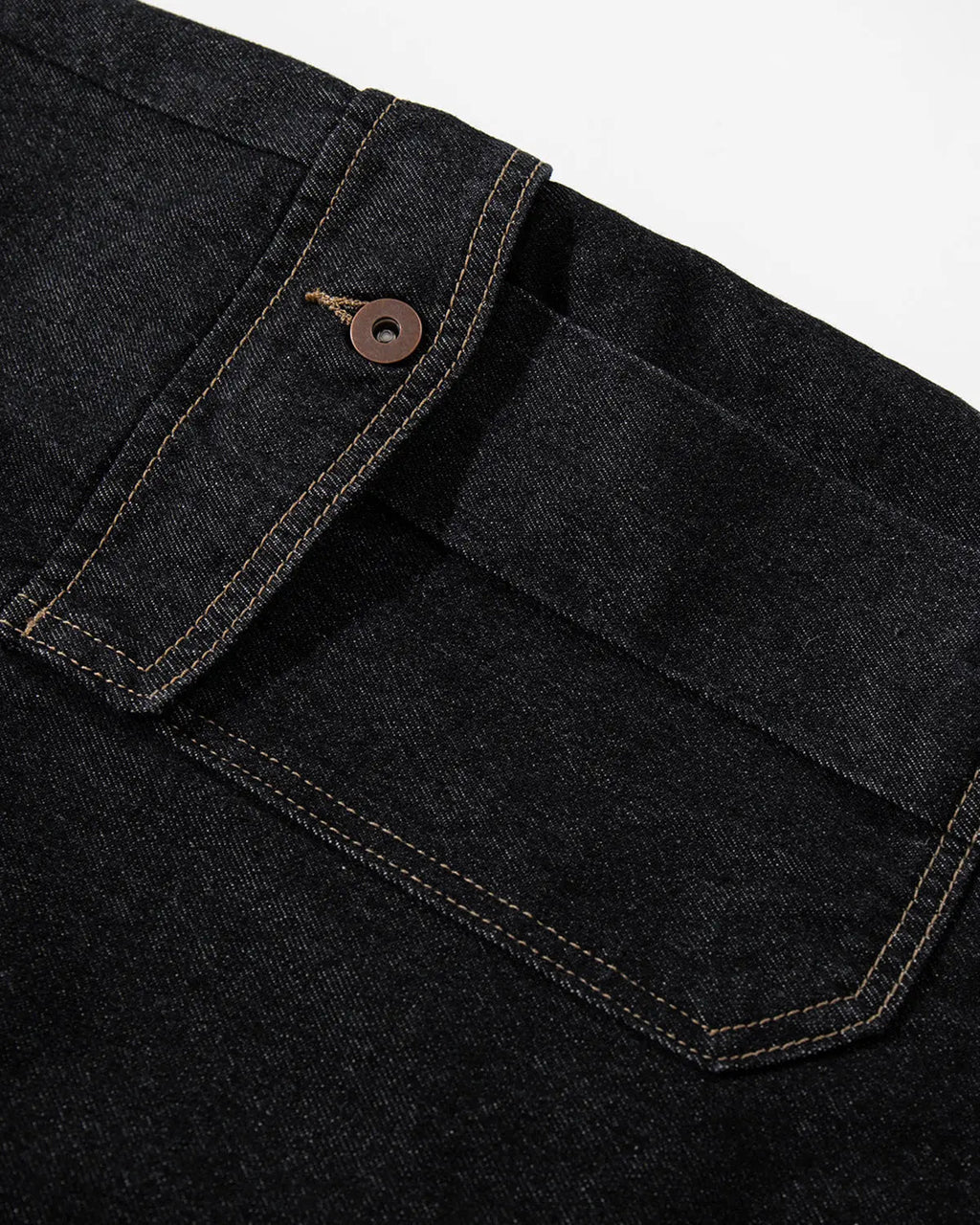 Raw denim longline cargo jorts by INFLATION, featuring a relaxed fit, multiple cargo pockets, and distressed details.