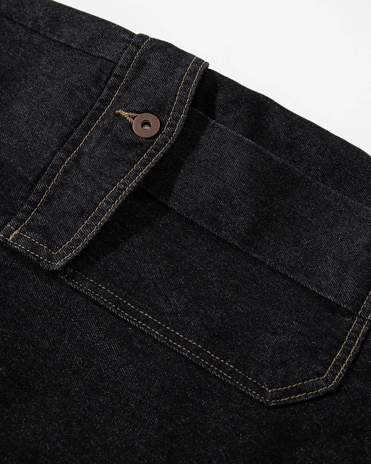 Raw denim longline cargo jorts by INFLATION, featuring a relaxed fit, multiple cargo pockets, and distressed details.