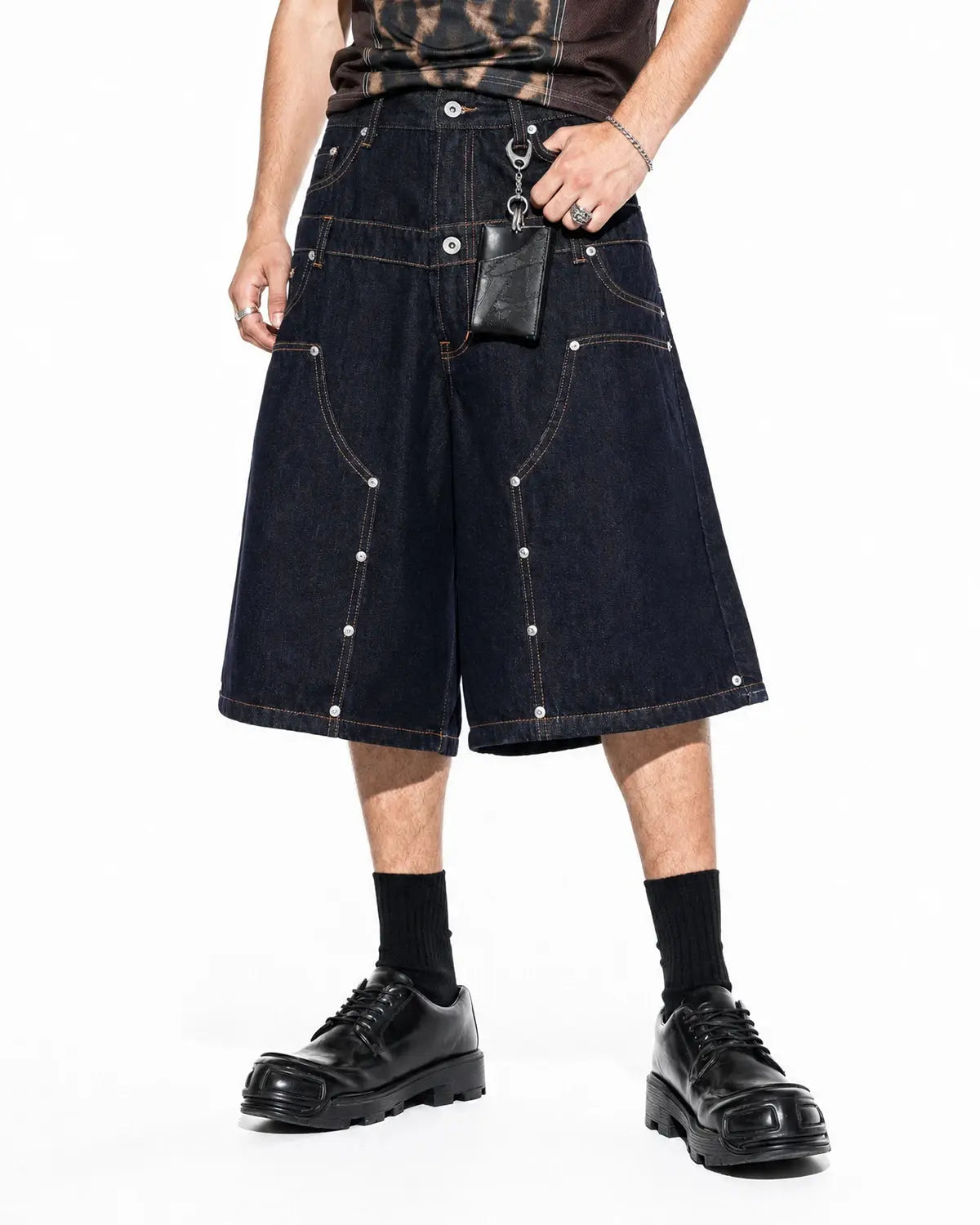 Inflation Streetwear double waist rivet baggy jorts, casual denim pants with rivet details and relaxed fit, on a white background.