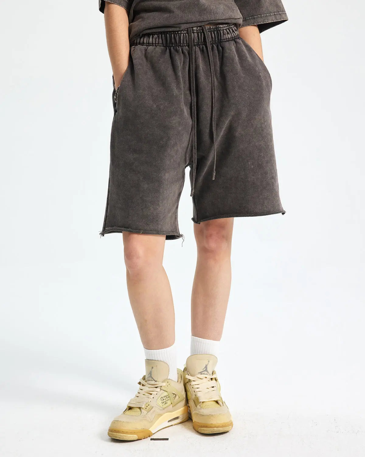 Inflation Heavyweight Washed Sweat Shorts featuring a relaxed fit and distressed denim look, casual streetwear pants for everyday wear.