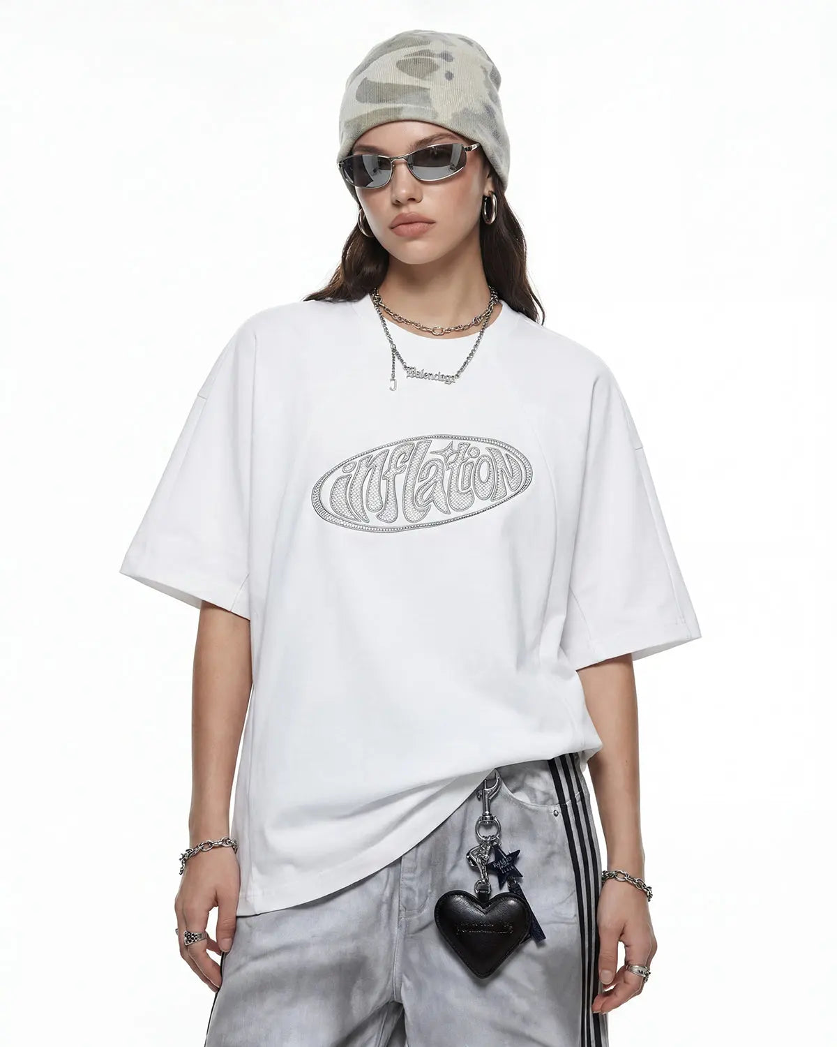 Hollow embroidered graphic T-shirt from Inflation Streetwear featuring bold design and detailed embroidery on a casual fit.