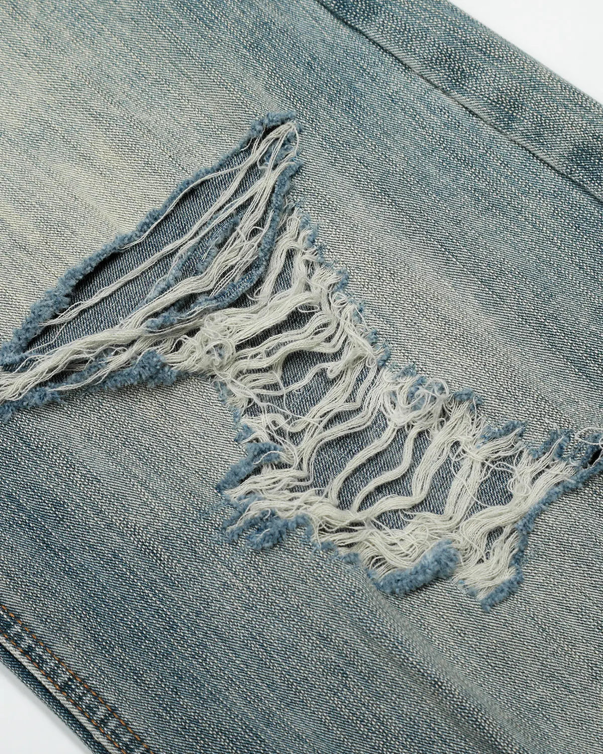 Bamboo weave distressed baggy jeans by INFLATION Streetwear featuring a relaxed fit and textured fabric detail.