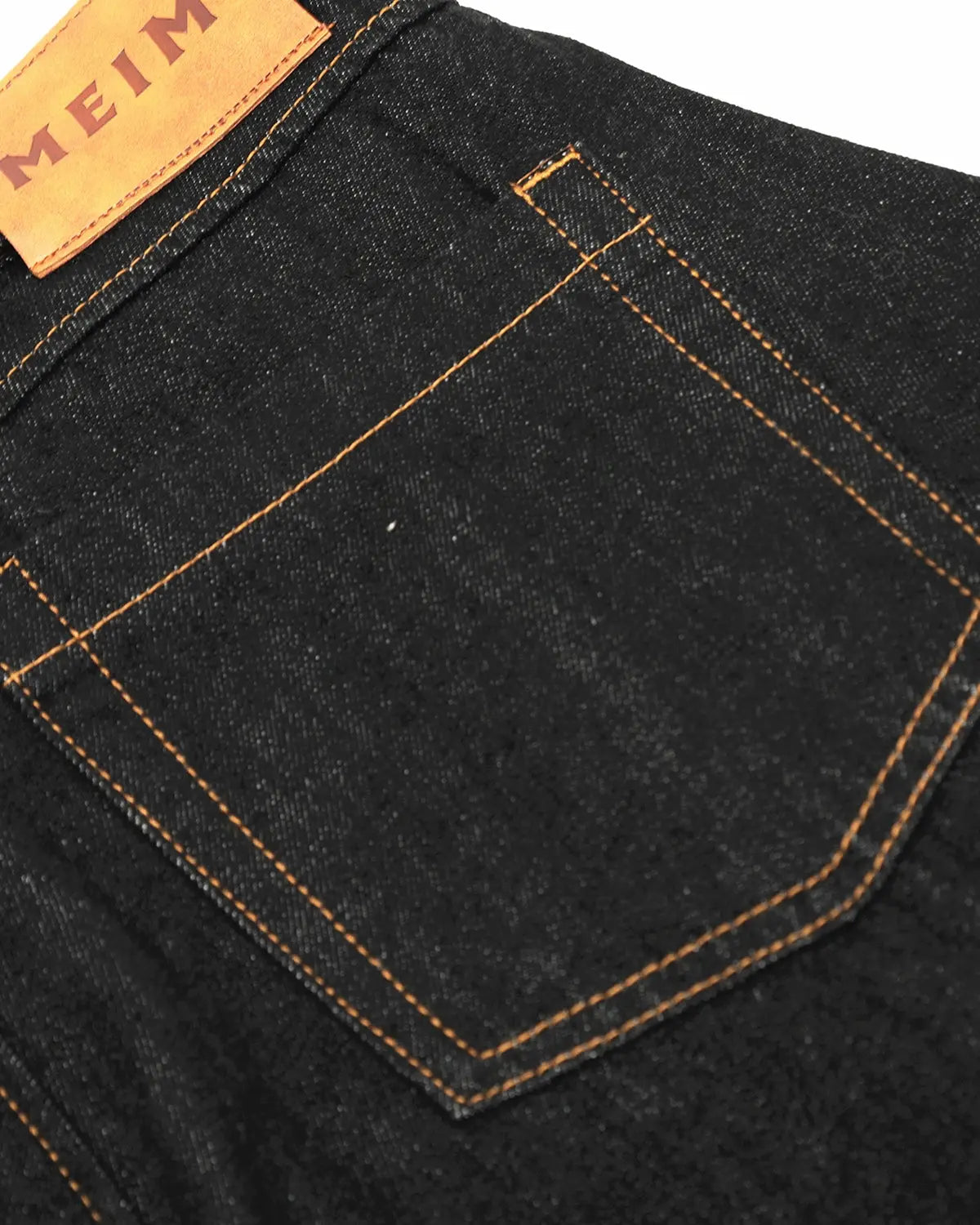Raw baggy jeans with contrast stitching from Flation Streetwear, featuring a relaxed fit and distressed denim design.