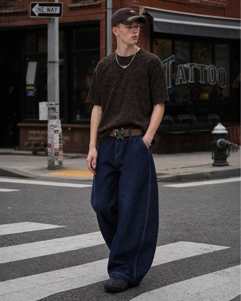 Raw Washed Barrel Jeans pants by Flation Streetwear, showcasing distressed denim with a relaxed fit and raw hem detail.