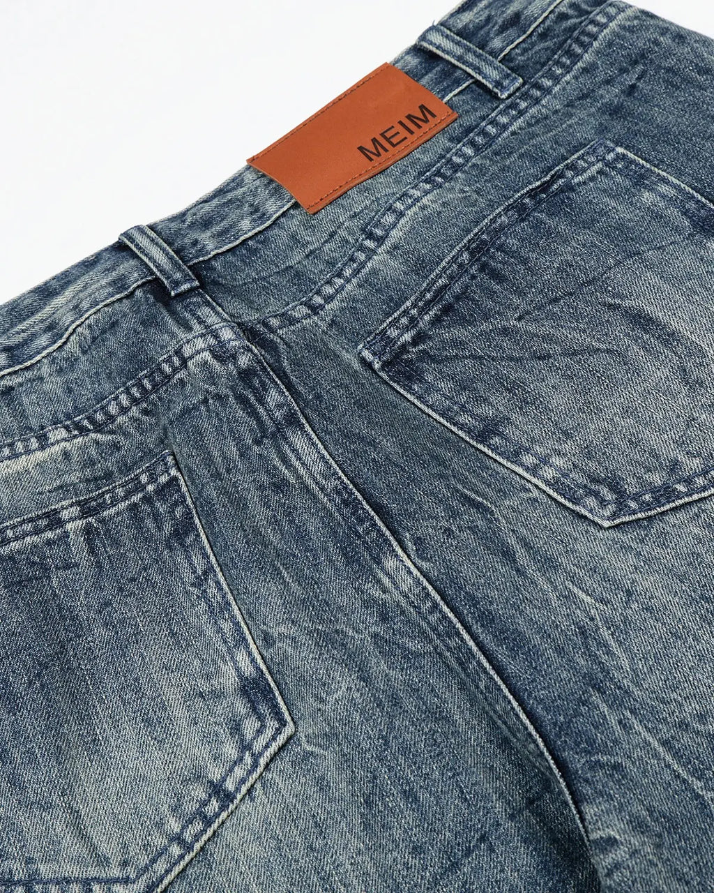 Textured baggy jeans from Inflation Streetwear featuring a relaxed fit and stylish distressed details.
