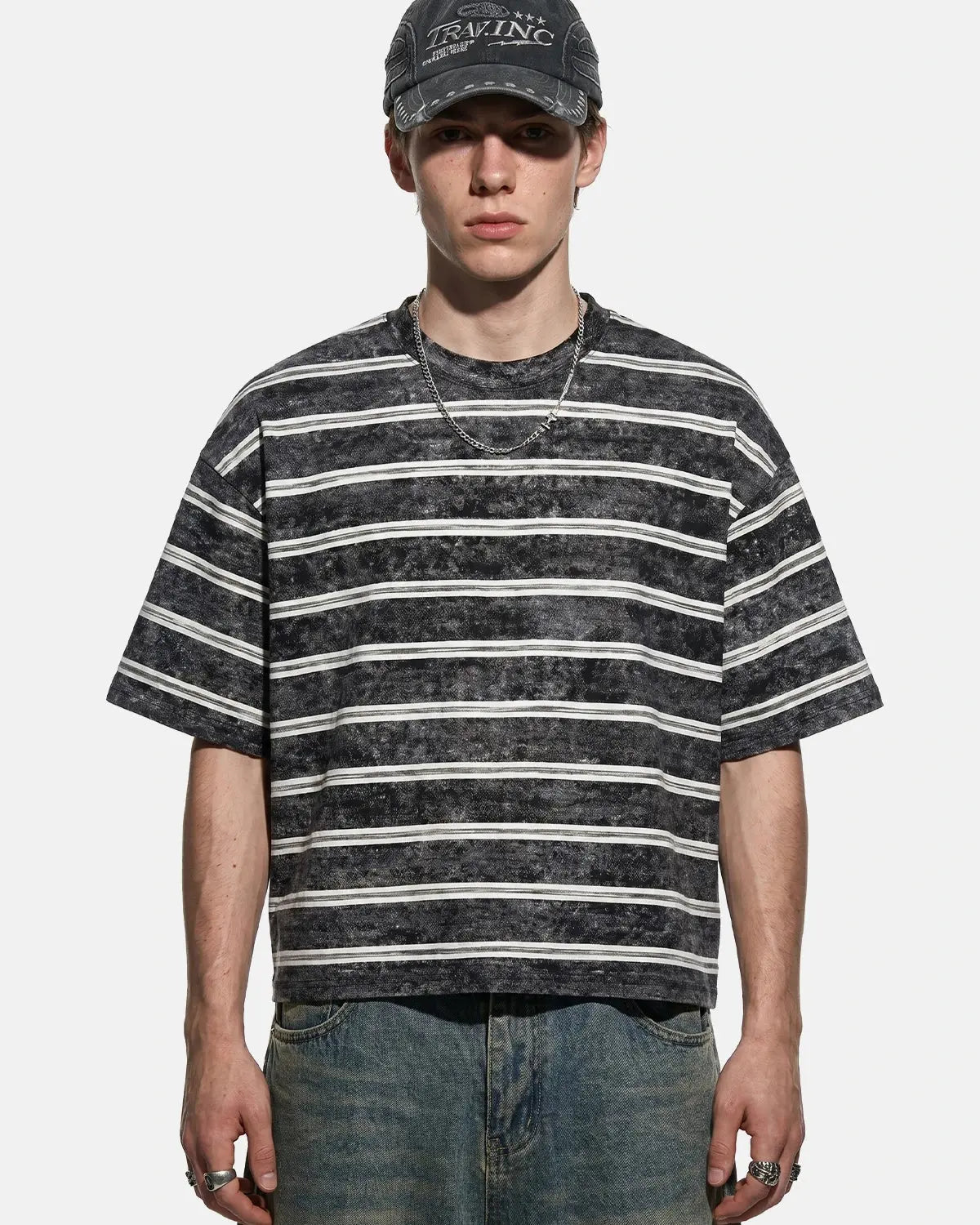Vintage Washed Striped Boxy T-Shirt by INFLATION, featuring a relaxed fit with faded washes and bold striped pattern.