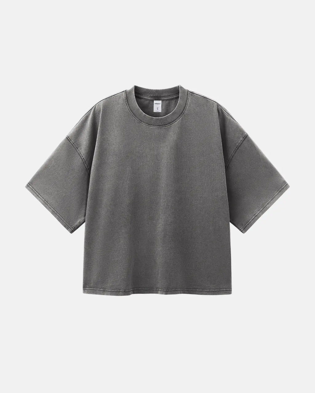 Distressed boxy washed Flation streetwear tee featuring a relaxed fit and faded, vintage-inspired design.