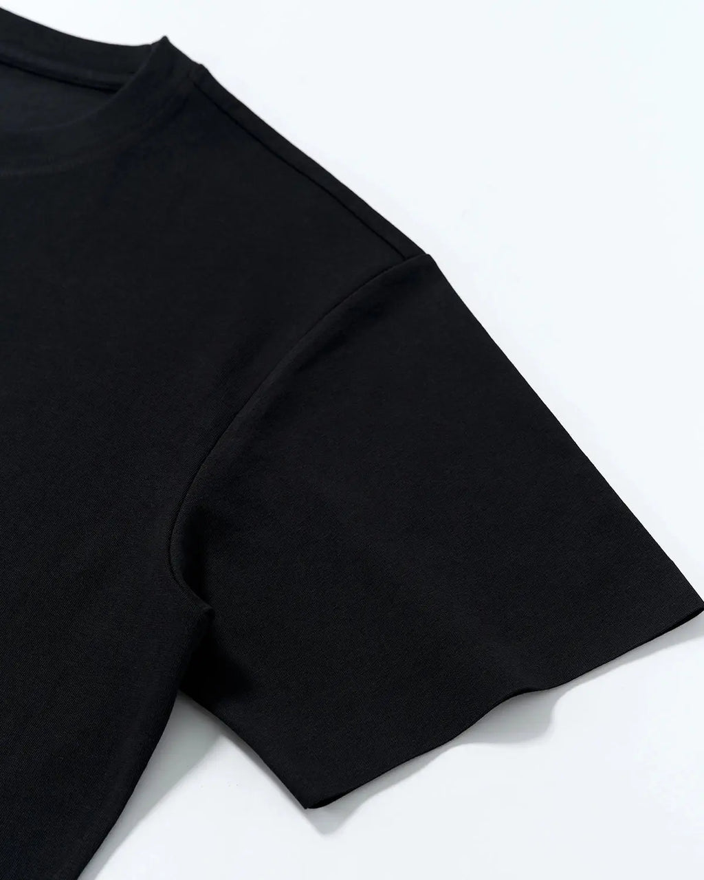 AirFlow Seam-Sealed Cooling Tee by INFLATION, featuring lightweight, breathable fabric and sleek streetwear style for active wear.