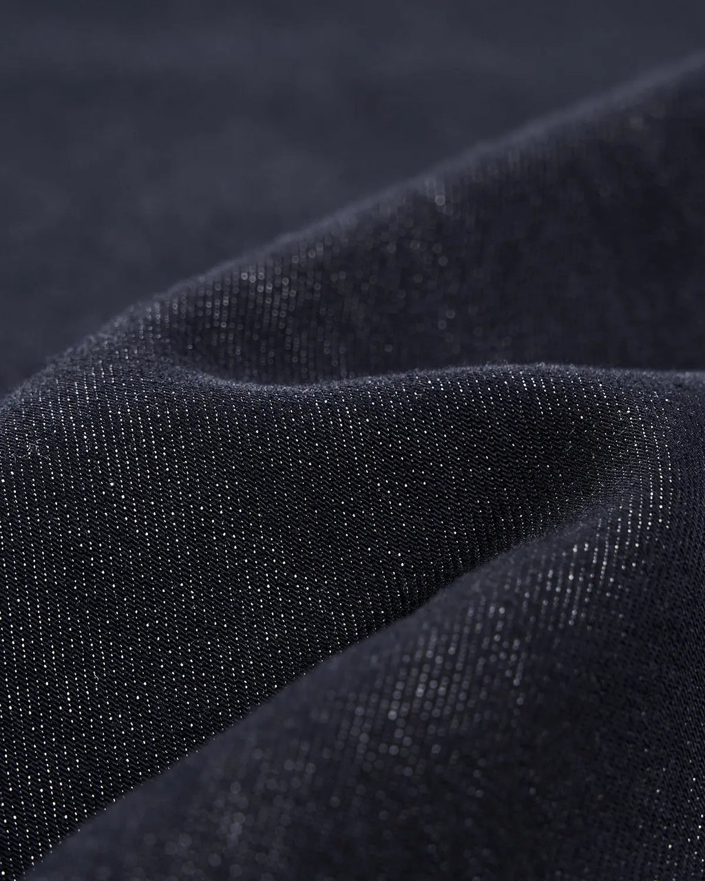 Raw silky denim jeans with belt by Flation, featuring a classic fit and detailed stitching, displayed on a neutral background.