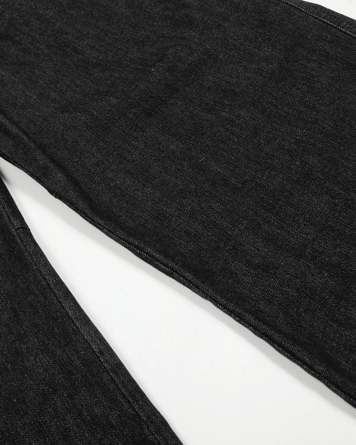 Inflation streetwear pleated raw baggy jeans with relaxed fit and distressed detailing, styled for casual urban looks.