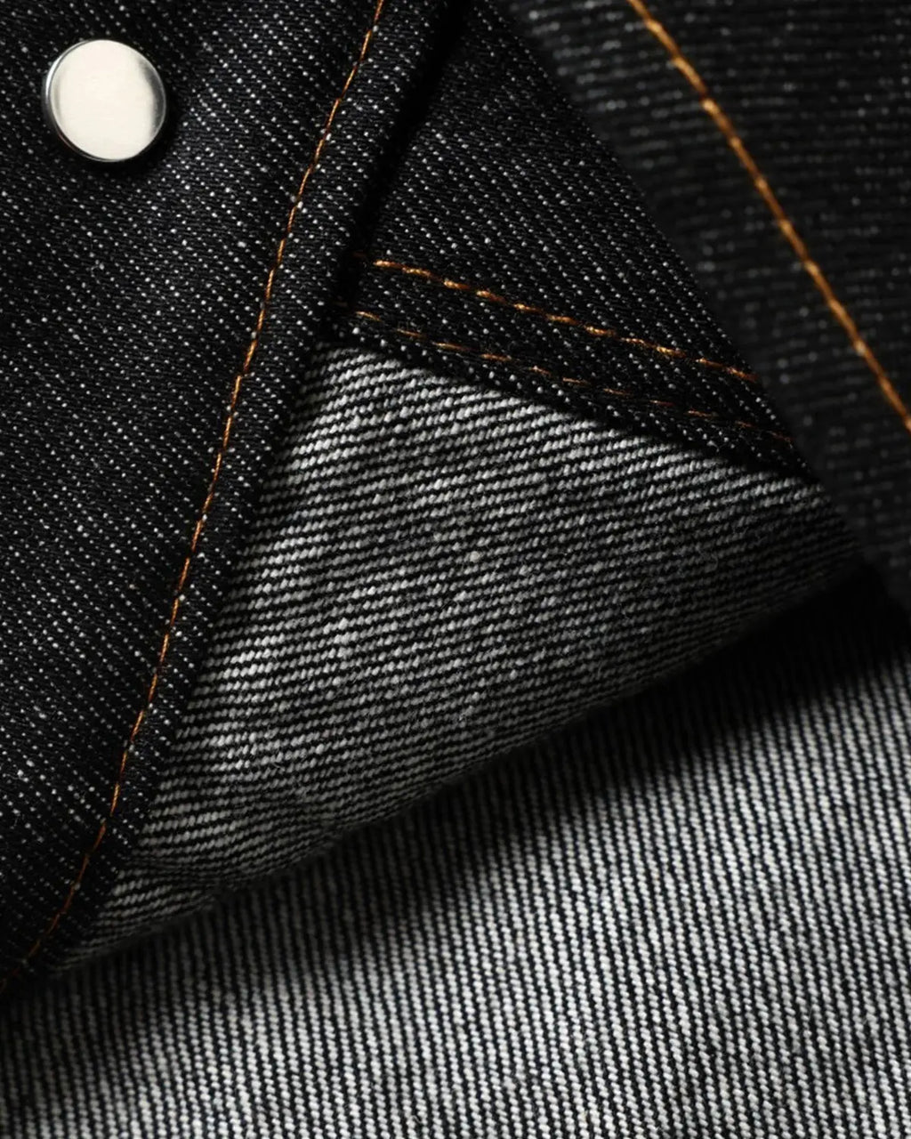 Metal toggle raw denim jacket by Flation Streetwear featuring metal fasteners and classic raw denim fabric.