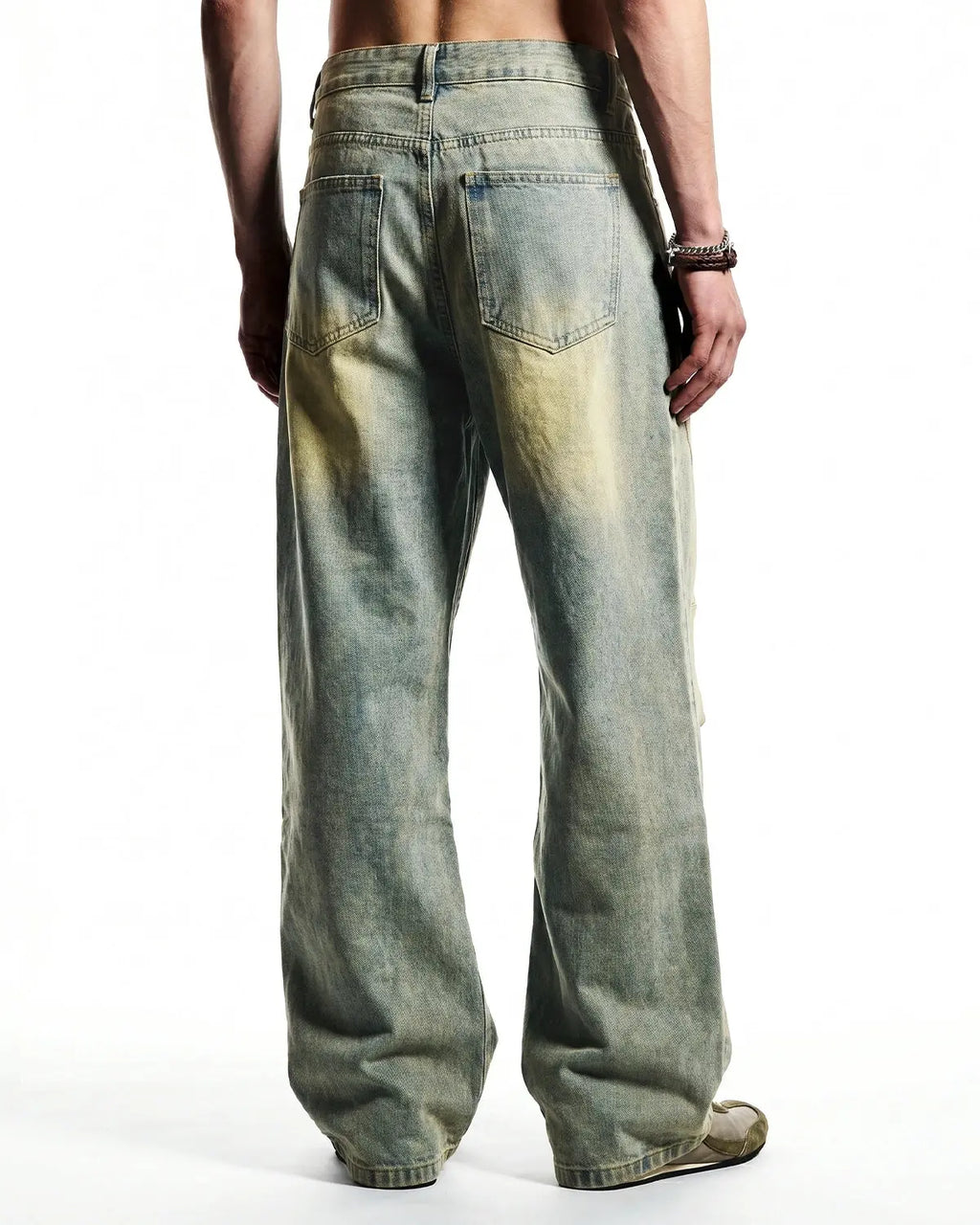 Vintage washed baggy jeans from Inflation Streetwear featuring distressed denim and relaxed fit style.