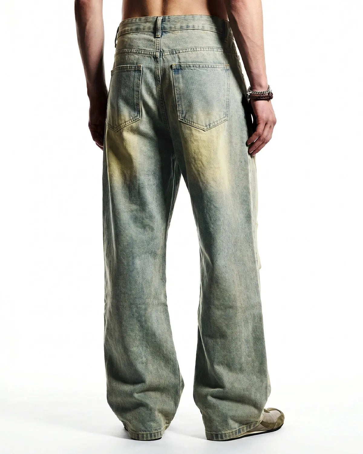 Vintage washed baggy jeans from Inflation Streetwear featuring distressed denim and relaxed fit style.