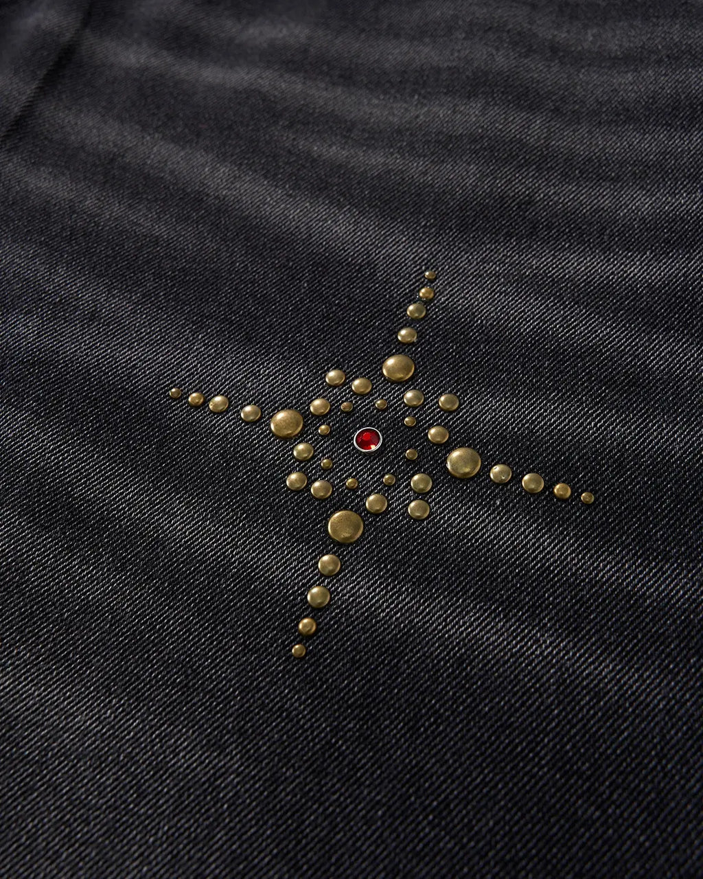 Distressed rhinestone ripped baggy jeans from INFLATION Streetwear, featuring ripped details and rhinestone embellishments.