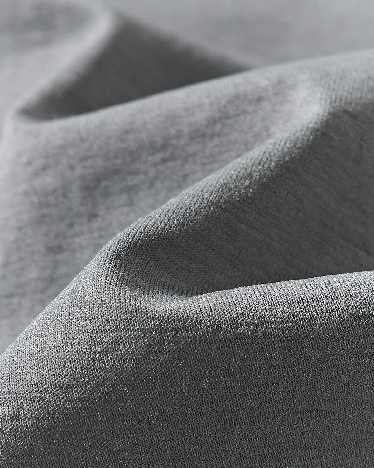 Water-Reveal Activewear T-Shirt by INFLATION featuring a sleek, modern design with water-reactive fabric and sporty fit.