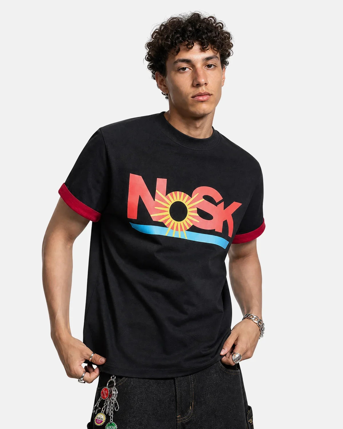 Graphic layered T-shirt by INFLATION streetwear featuring a bold, colorful design on a casual men's T-shirt.
