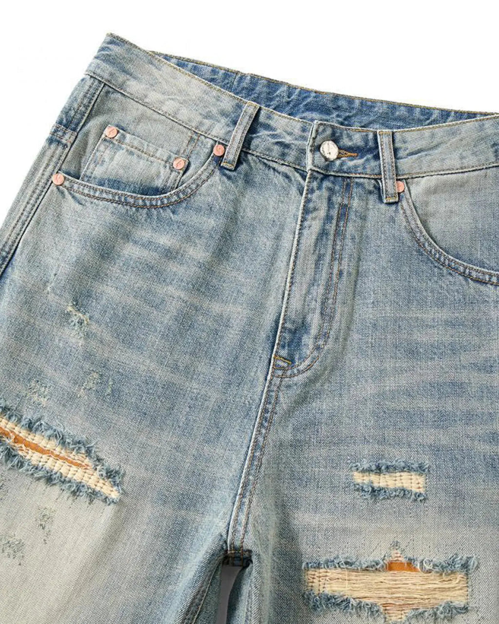 Inflation brand distressed ripped straight-leg jeans, casual pants with frayed details and a relaxed fit, shown on a model.