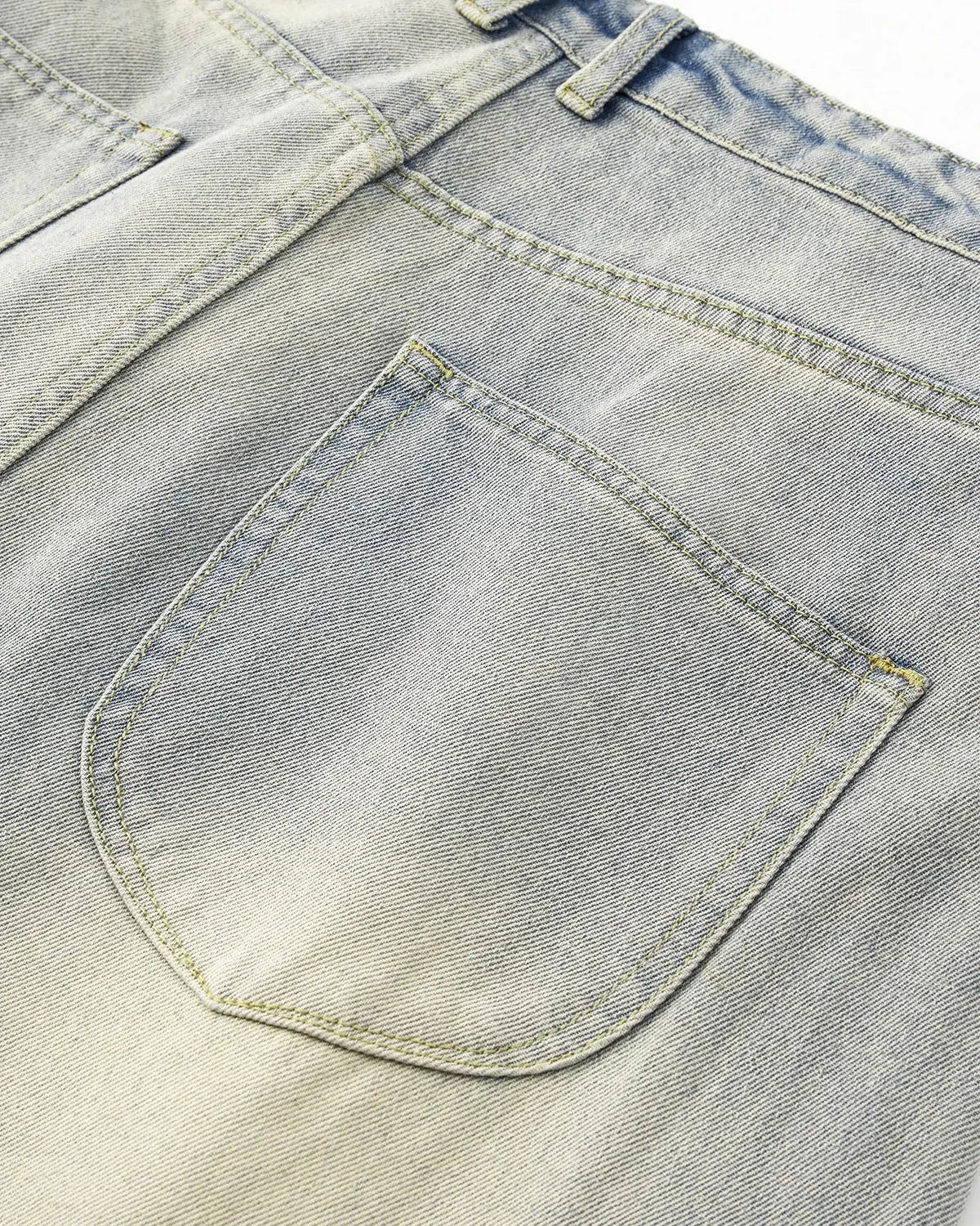 Acid washed super baggy jeans from Flation Streetwear, showing relaxed fit with distressed details and faded denim appearance.