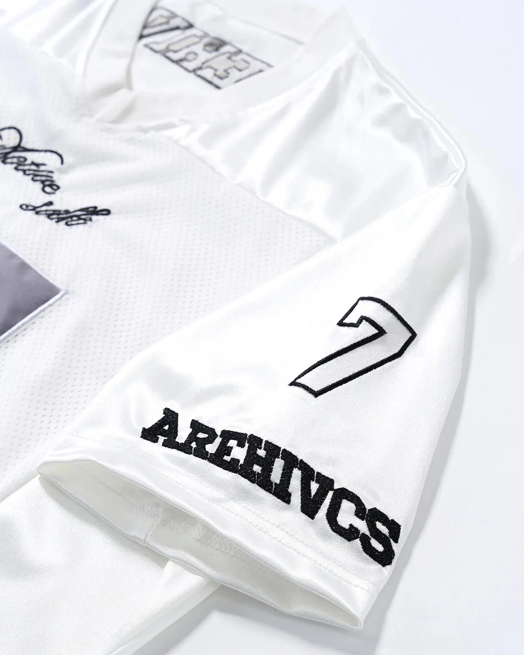 Inflation Streetwear mesh patchwork number jersey featuring bold numbers and vibrant patchwork design on a stylish athletic top.