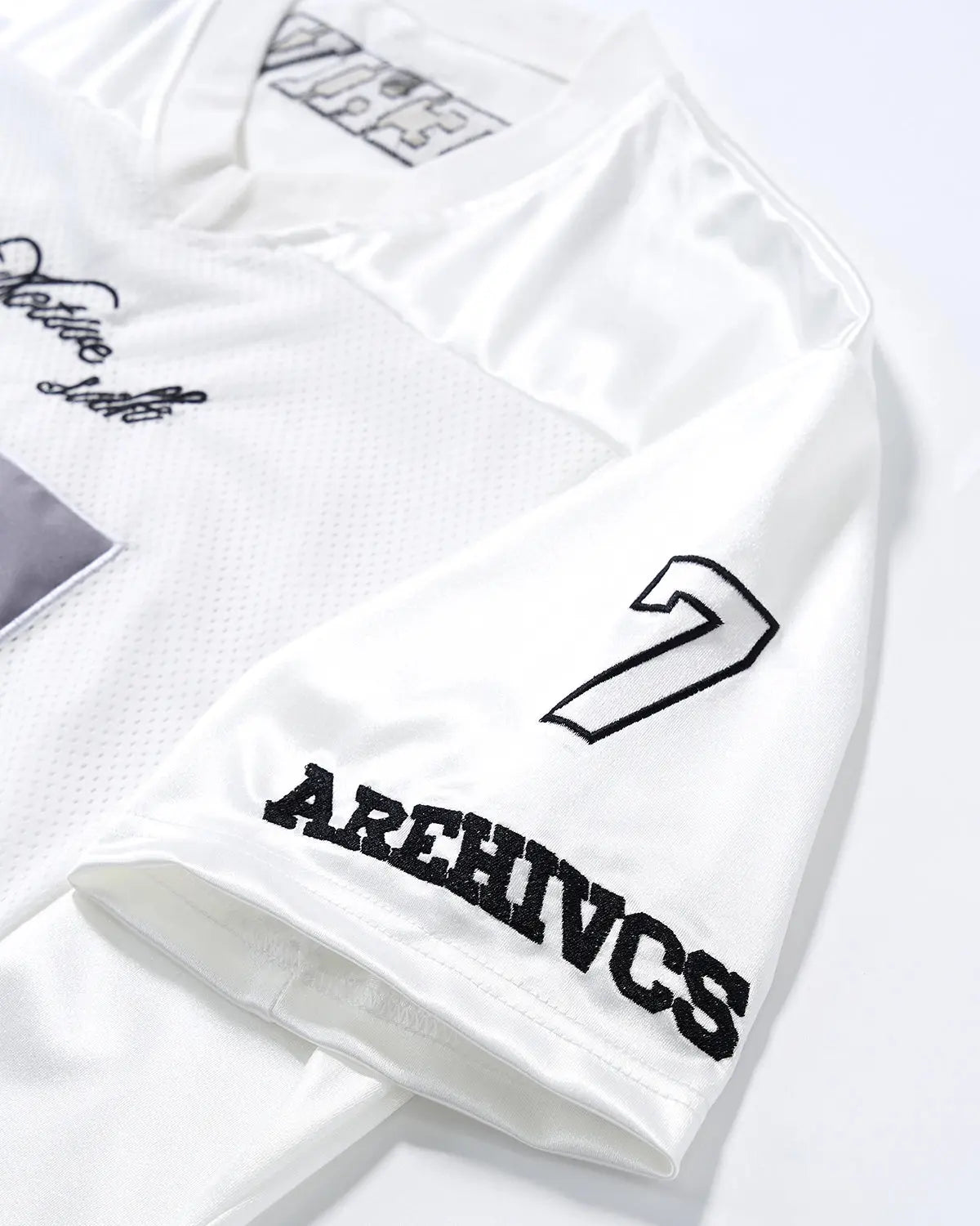 Inflation Streetwear mesh patchwork number jersey featuring bold numbers and vibrant patchwork design on a stylish athletic top.