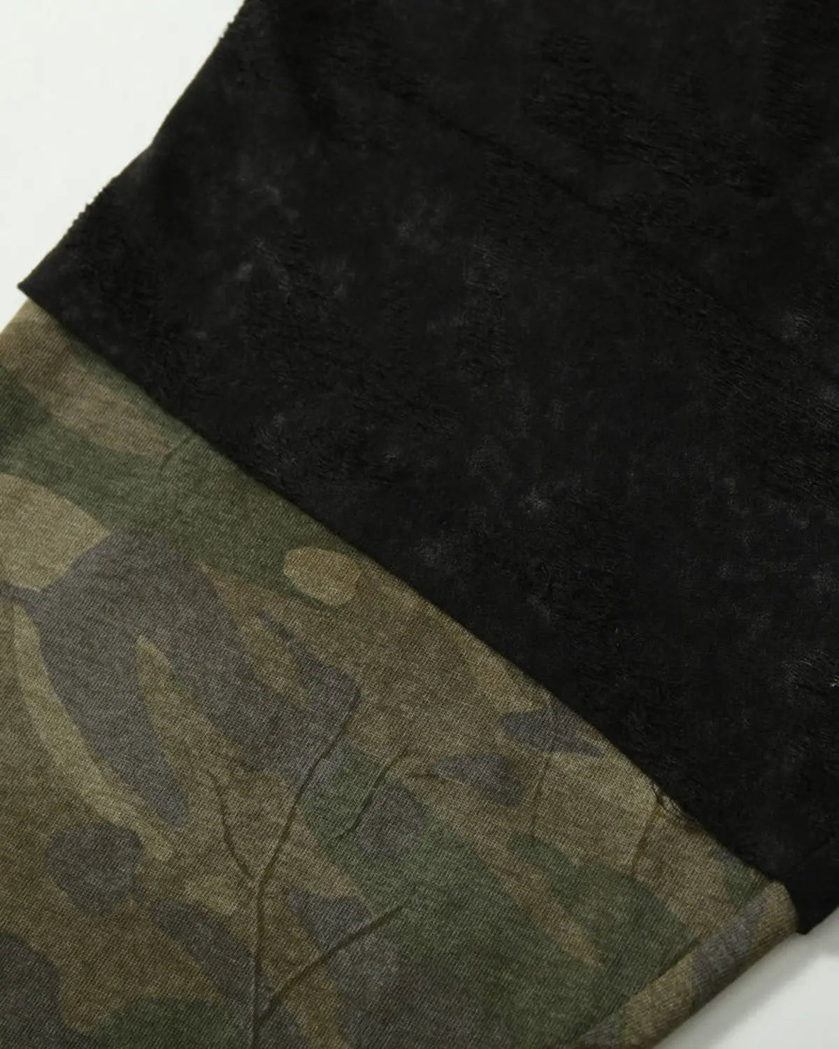 Inflation Streetwear lace patchwork camo raglan tee featuring mixed lace and camouflage fabric in a casual fit.