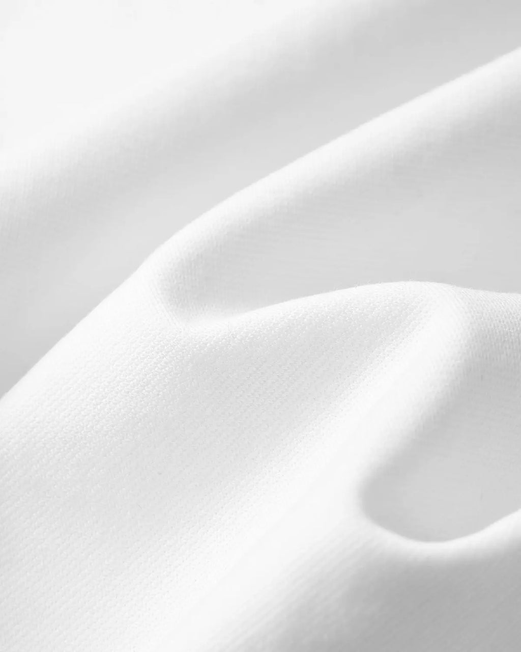 Inflation Streetwear Mock Neck 23 New York Jersey, close-up of black jersey fabric with logo details.