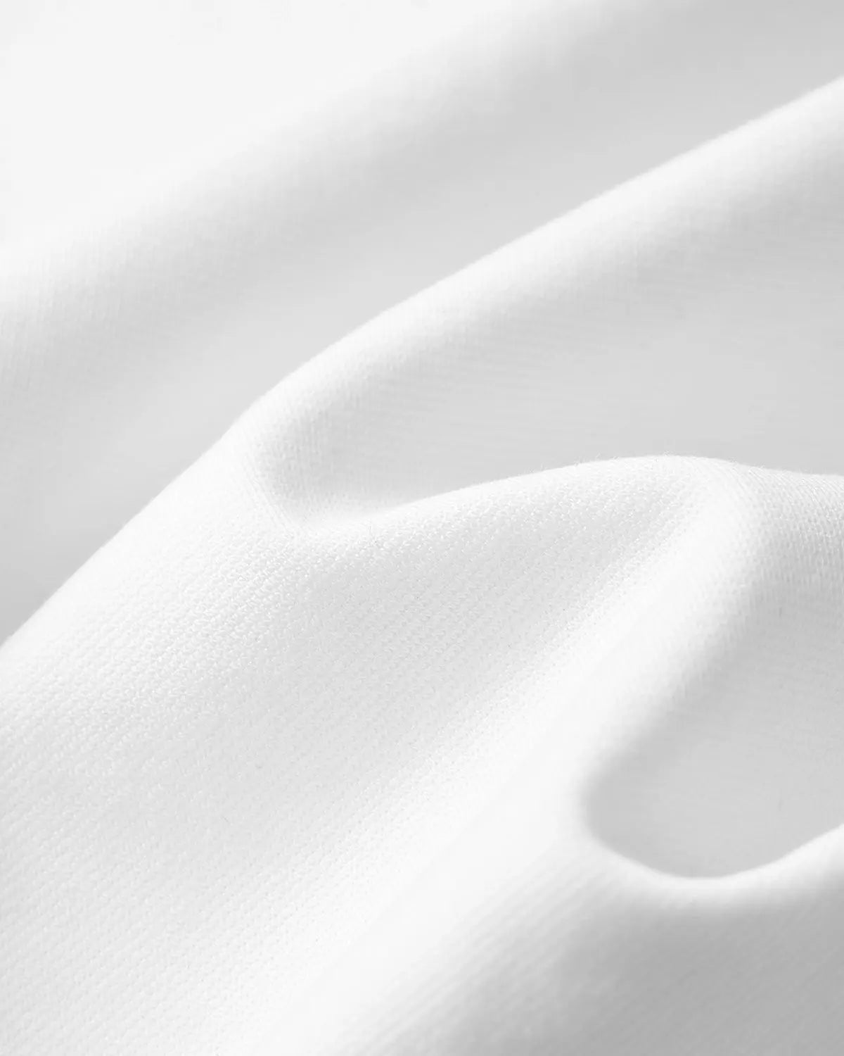 Inflation Streetwear Mock Neck 23 New York Jersey, close-up of black jersey fabric with logo details.