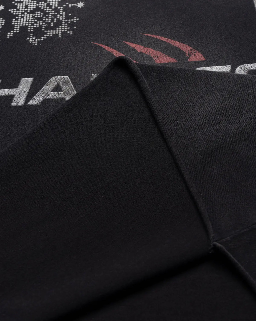 Inflation Streetwear distressed washed graphic t-shirt featuring a worn-in look and bold printed design on the front.