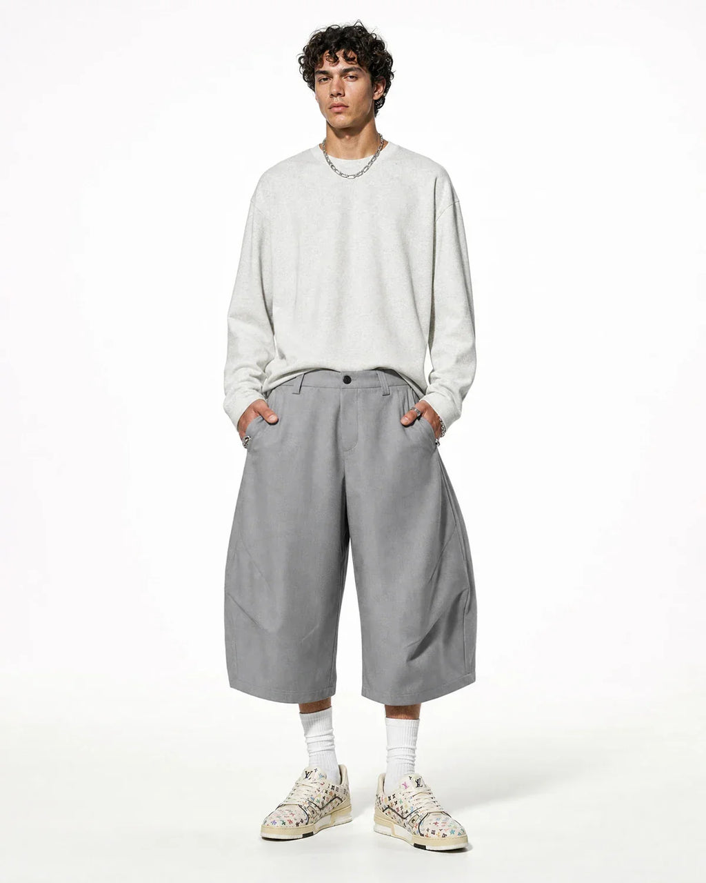 Pleated barrel-tailored Bermuda shorts by Flation Streetwear, showcasing a stylish fit and classic design in neutral fabric.