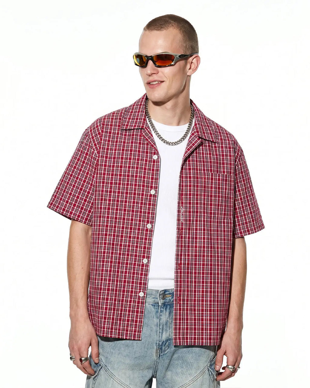 Inflation Streetwear plaid script embroidered short-sleeve shirt with a checkered pattern and embroidered logo on the front.