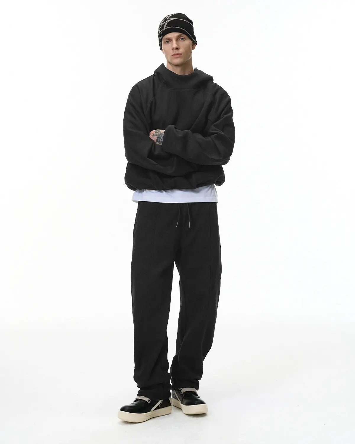 Blank Comfy Barrel Sweatpant by INFLATION featuring a relaxed fit and soft fabric, shown in a neutral color.