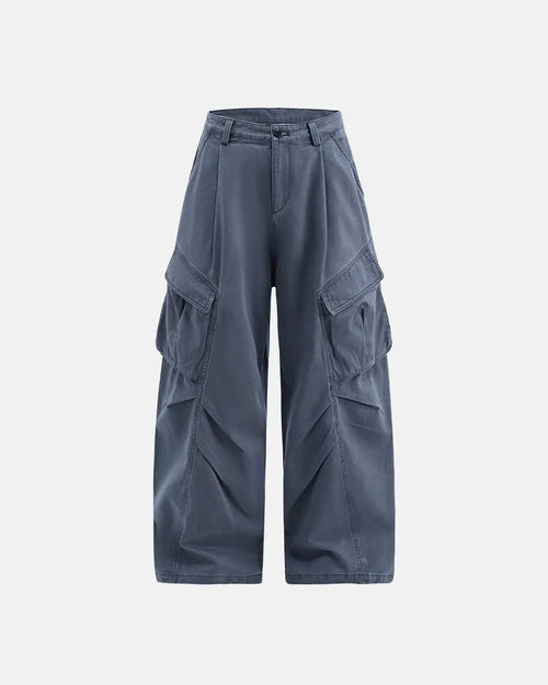 Flation Baggy Cargo Pants with multiple pockets, relaxed fit, and streetwear style, shown on a model with casual urban background.