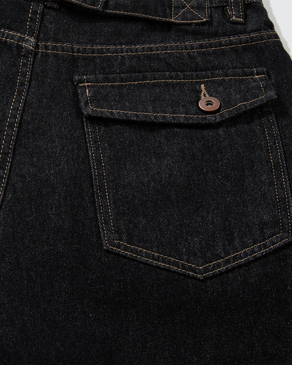 Raw denim longline cargo jorts by INFLATION, featuring a relaxed fit with multiple cargo pockets and distressed details.