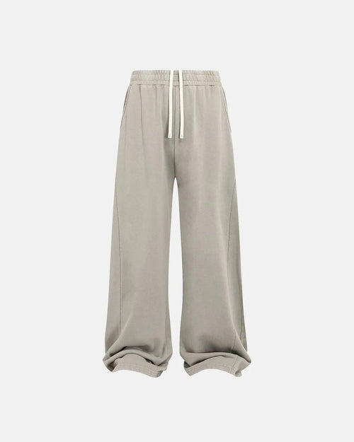 Acid wash stitching straight leg sweatpants by Flation Streetwear featuring distressed details and relaxed fit.