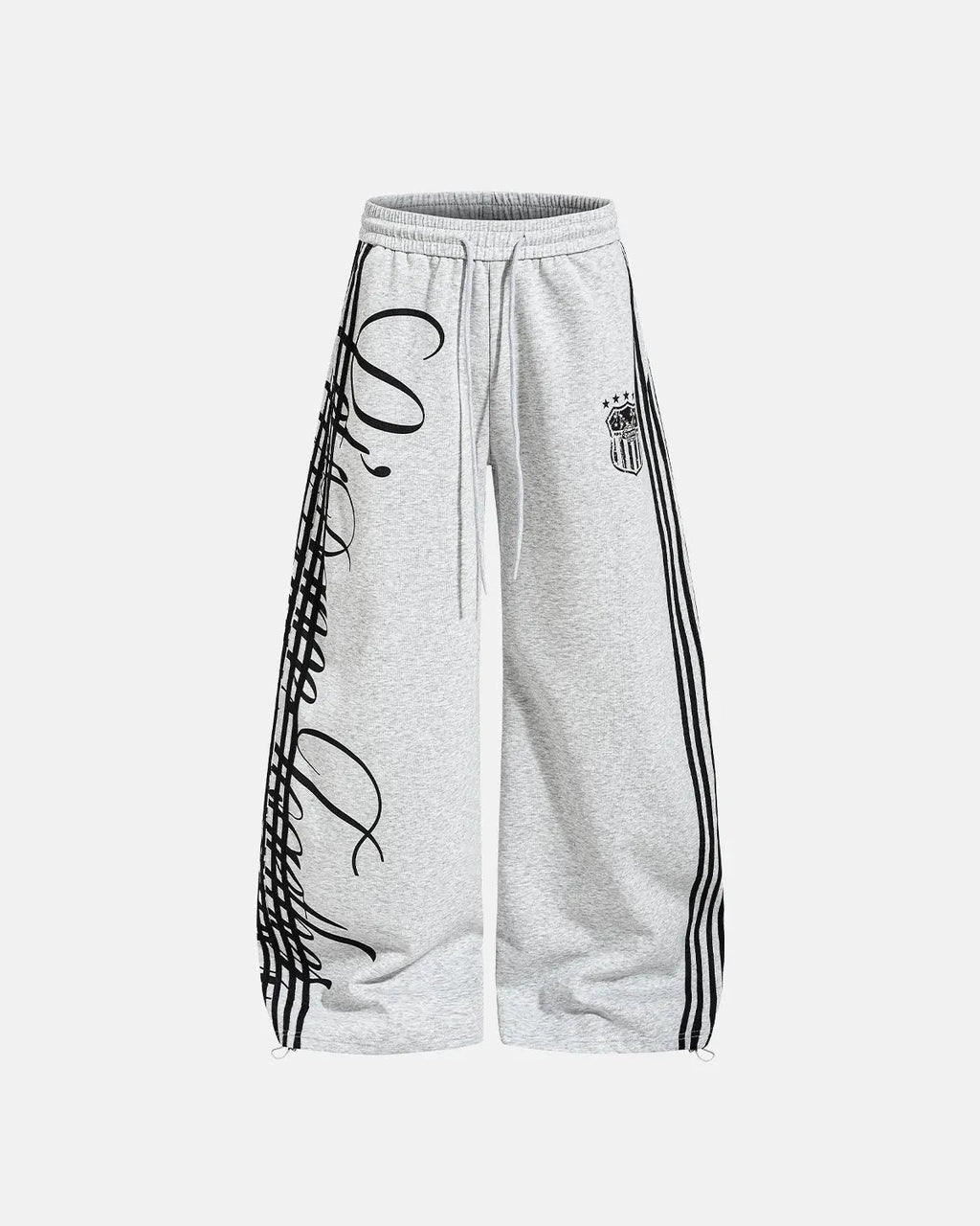 Inflation Script Stripe Baggy Sweatpants, relaxed fit streetwear pants with bold stripe design and comfortable waistband.