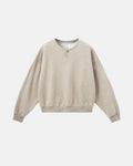 Boxy fit Henley collar sweatshirt by Flation featuring a relaxed silhouette, ribbed cuffs, and a casual streetwear style.