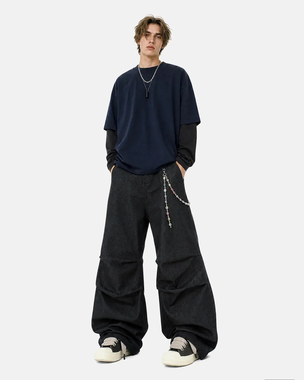 Inflation Super Raw Baggy Jeans featuring a relaxed fit, distressed details, and classic blue denim for streetwear style.