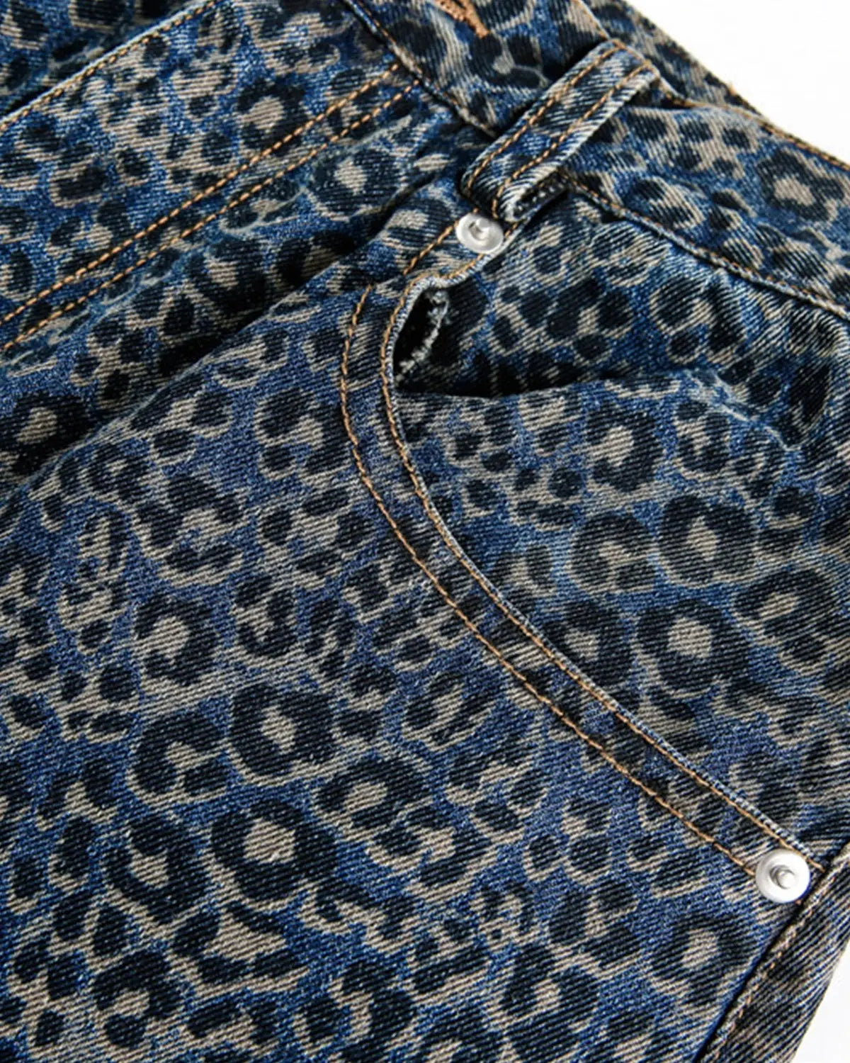 Vintage leopard print barrel jeans by INFLATION, featuring a retro-inspired fit and bold animal print design.