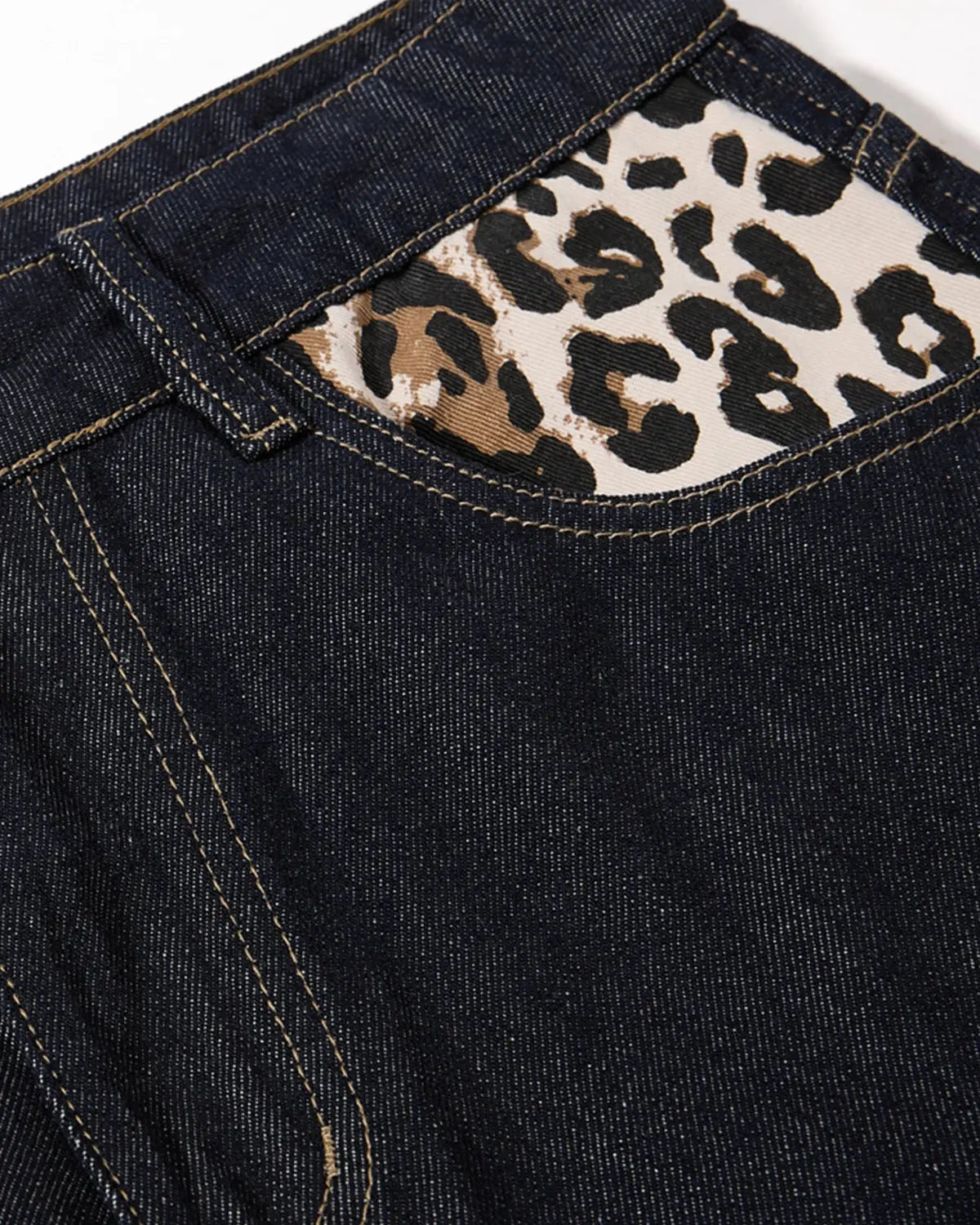 Inflation Streetwear leopard star patch barrel jeans featuring distressed denim and bold star and leopard patch designs.